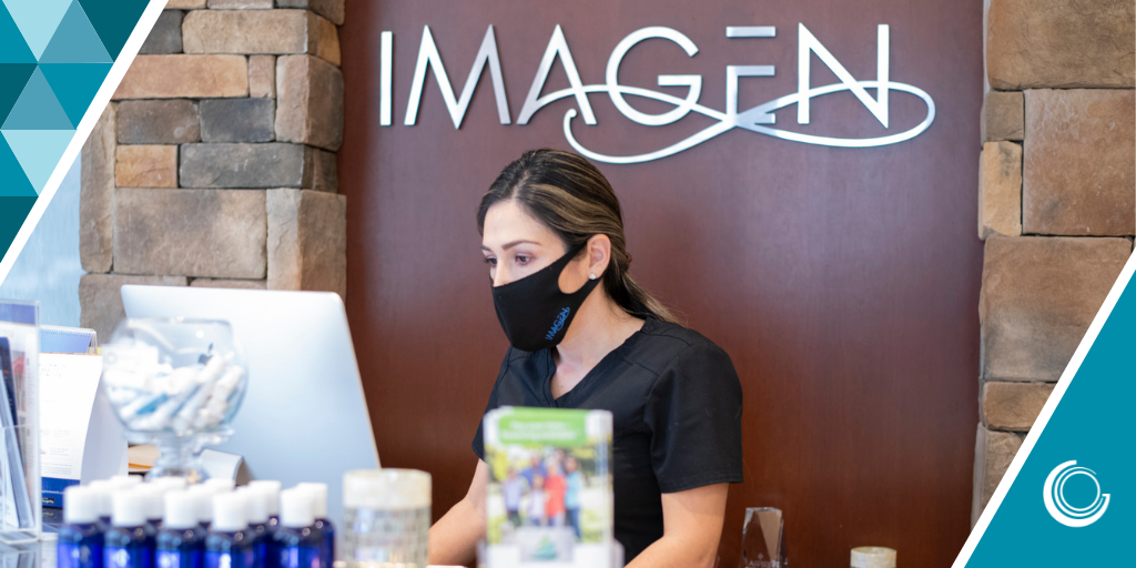 Photo of woman working behind the Imagen Body Sculpting welcome desk.